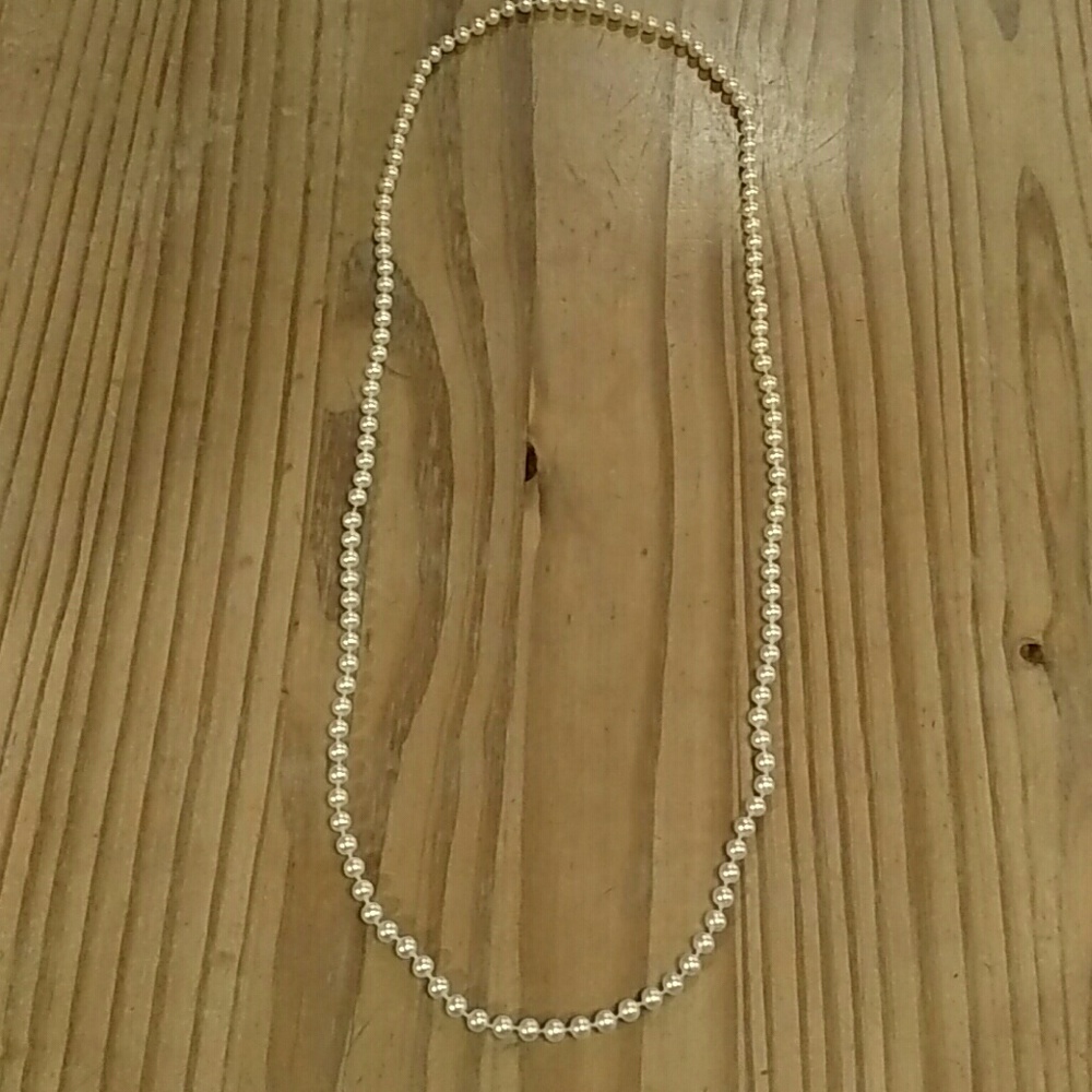 Long strand pearl look beads! Goes with everything
